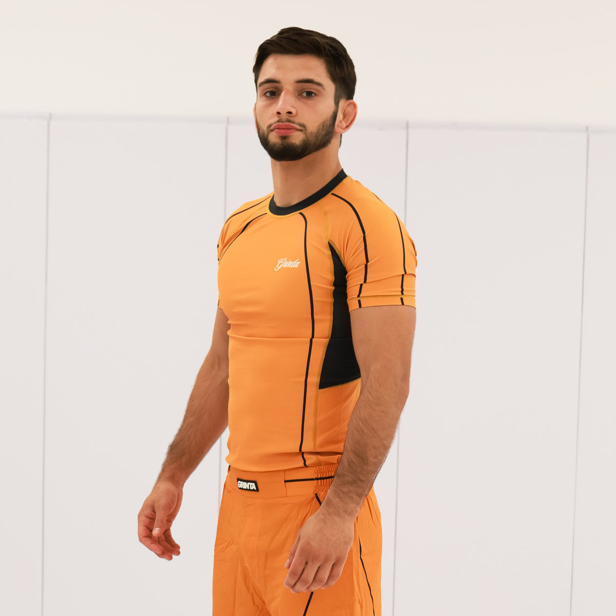 Flow Rashguard - Orange/Black