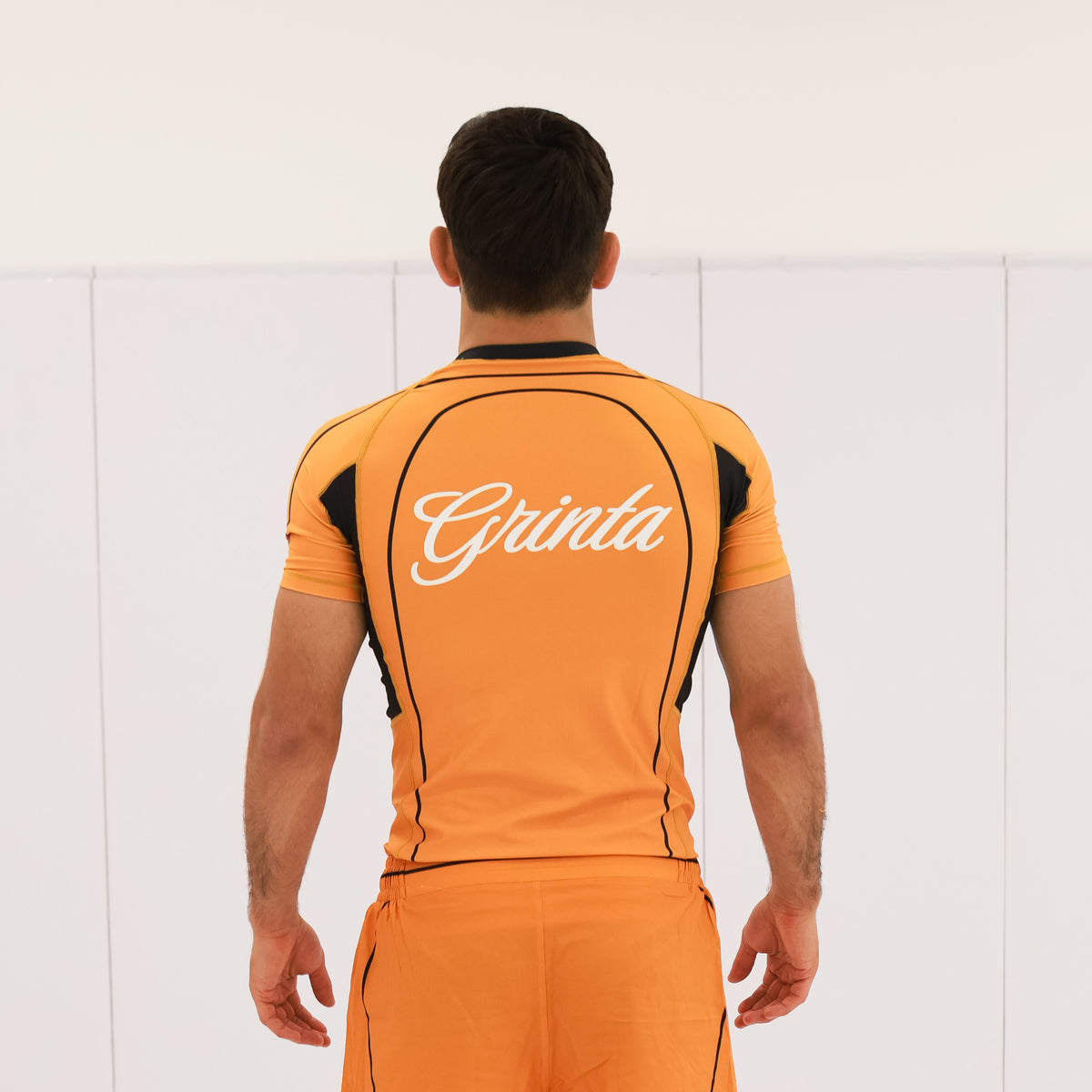 Flow Rashguard - Orange/Black